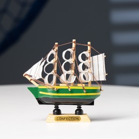 {{photo.Alt || photo.Description || 'Корабль сувенирный малый «Аркхем», борта синие с жёлтой полосой, паруса белые, 3×10×10 см'}}