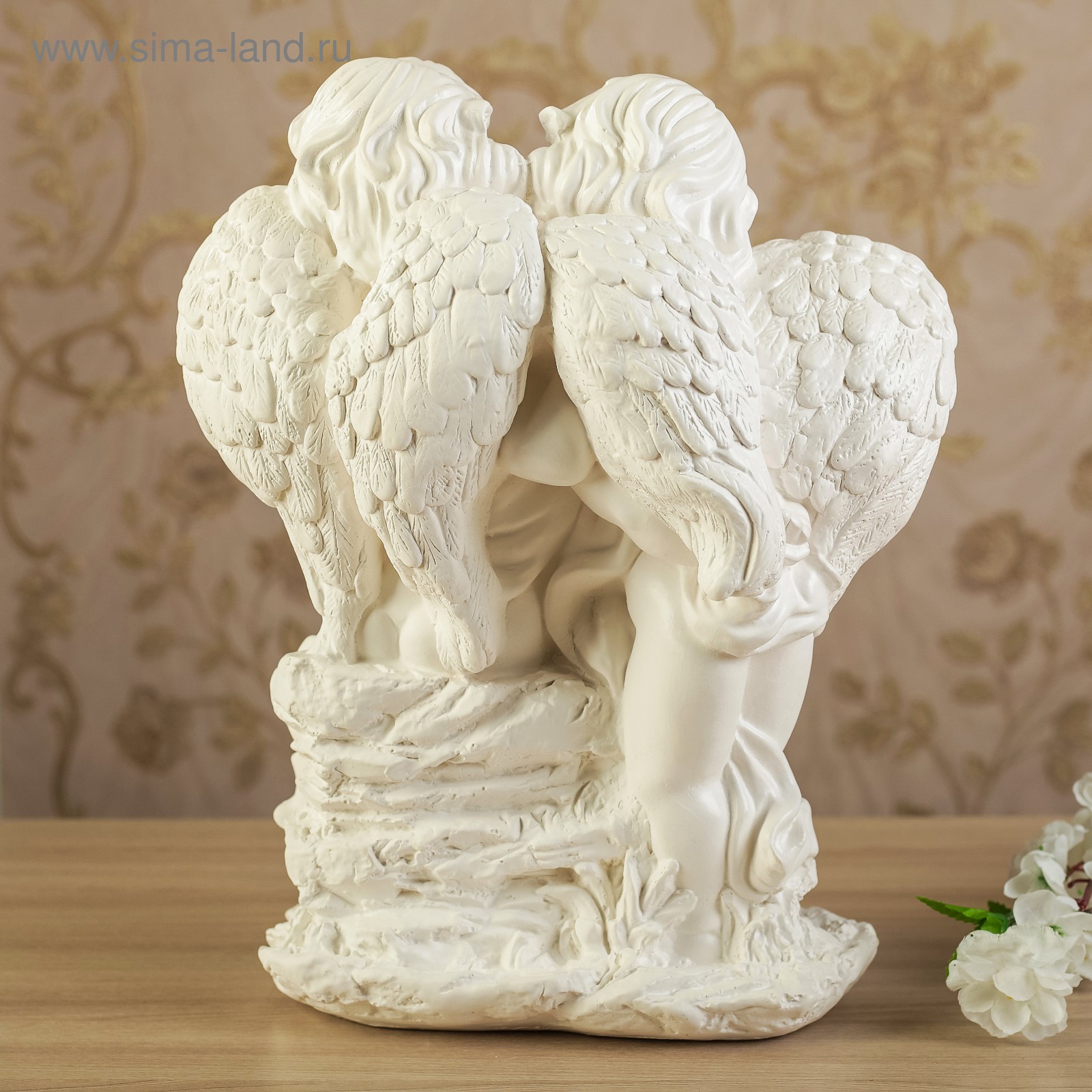 Скульптуры из гипса в интерьере ангел