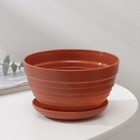 The pot stand is 0.5 l "Alice", color terracotta