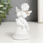 Souvenir Polyresin "White angel on the bell" 8 x 4,2x4 cm