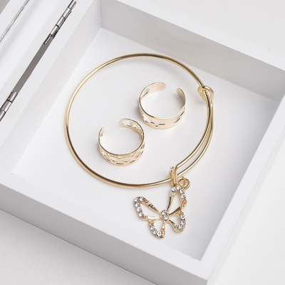 A set of children's "Vibracula" 3 PR: bracelet, 2 rings, butterfly, white gold