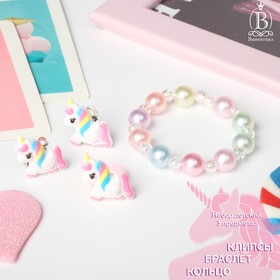 A set of children's "Vibracula" 3 items: clip-on earrings, bracelet, ring, unicorns, colored