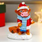 Souvenir Polyresin candlestick "Bull in a Christmas coat with a cart"