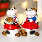 Polyresin piggy "Cow with ribbons and an apron, with coins" MIX 11,5x7,5x9 cm Polyresin piggy "Cow with ribbons and an apron, with coins" MIX 11,5x7,5x9 cm