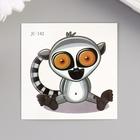 The tattoo on the body colored "Baby lemur" 6x6 cm