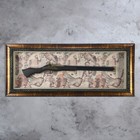 Souvenir panel with a gun on the world map frame under the patina Souvenir panel with a gun on the world map frame under the patina