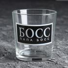 A glass of whiskey, "Daddy boss" black background A glass of whiskey, "Daddy boss" black background