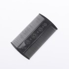 Comb is double-sided, color black