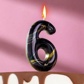 Candle in black marble cake, digit 