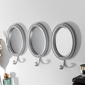 Decorative hooks with a mirror 