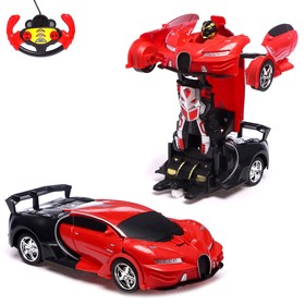 The radio -controlled “shyron” robot is transformed, light and sound effects, the color is red. 