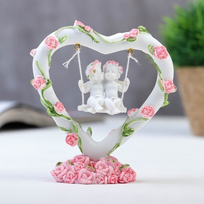 анегелы на качелях