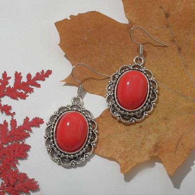 Earrings "Naturelle" oval in the edging, the color red in nielloed silver